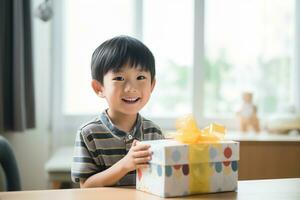 AI generated Cute asian little boy holding a gift box photo