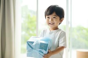 AI generated Cute asian little boy holding a gift box photo