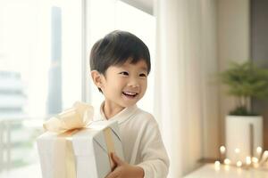 AI generated Cute asian little boy holding a gift box photo