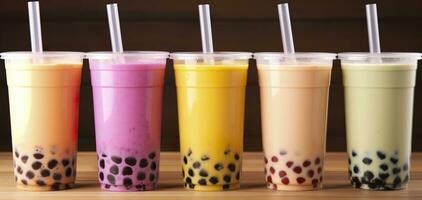 AI generated Plastic cups of different tasty bubble tea on wooden background. Generative AI photo