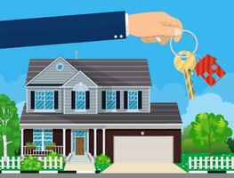 hand with house key and cottage vector