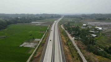 Aerial view of toll road that surrounded by nature in Boyolali, Java , Indonesia video