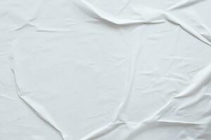 Blank white crumpled and creased paper poster texture background photo