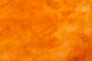 Textured wall brushed painted Background, Abstract Orange Oil Color. photo