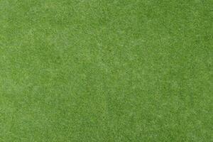 Artificial turf - green grass background photo