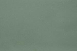 Surface of Smooth Olive green cement wall texture background for design in your work concept backdrop. photo