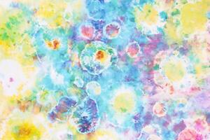 colorful tie dye pattern hand dyed on cotton fabric abstract texture background. photo