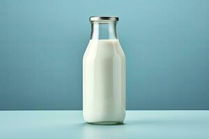 AI generated A glass bottle with full milk on blue background. AI Generated photo