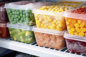 AI generated Frozen food in the freezer. Frozen vegetables. AI Generated photo