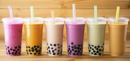 AI generated Plastic cups of different tasty bubble tea on wooden background. Generative AI photo