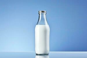 AI generated A glass bottle with full milk on blue background. AI Generated photo