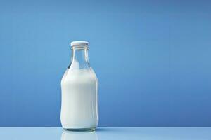 AI generated A glass bottle with full milk on blue background. AI Generated photo