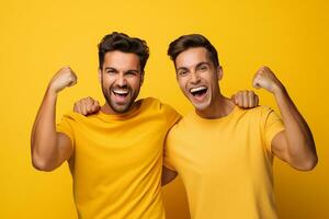 ai generado retrato de un dos contento joven hombres triunfando alegre expresiones aislado terminado amarillo antecedentes foto