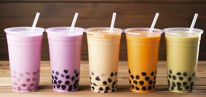 AI generated Plastic cups of different tasty bubble tea on wooden background. Generative AI photo