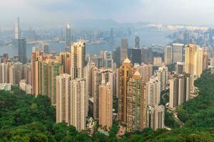 view of victoria harbour and hong kong island over victoria peak in hongkong, china photo