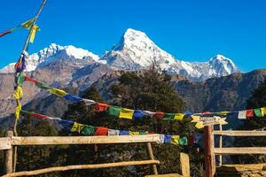 Annapurna peak and Prayer flag on poon hill in Himalayas, nepal photo