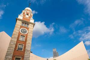 el reloj torre en el del Sur apuntalar de tsim sha tsui, kowloon, hong kong, China foto