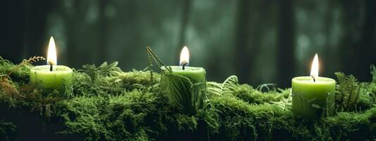 AI generated Burning candles on moss, dark green blurred the natural background. Magic candle. Generative AI photo