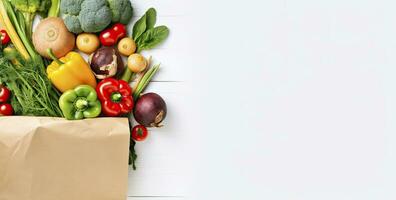 AI generated Healthy food in paper bag vegetables and fruits on white background. AI Generated photo