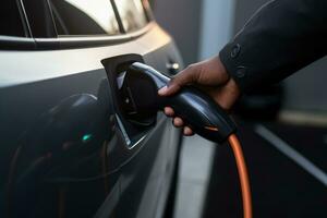 AI generated Electric car or EV is charging, Hand inserting EV charging plug to electric vehicle, AI Generative photo