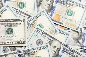 heap of US Dollar bills, money background. Top view of business concept on background with copy space photo