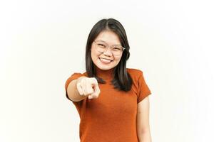 Smiling and Pointing at You, Want You Gesture Of Beautiful Asian Woman Isolated On White Background photo