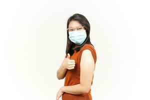 Wearing Mask And Get A Corona Virus Vaccine Of Beautiful Asian Woman Isolated On White Background photo
