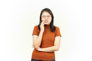 Suffering Toothache Gesture Of Beautiful Asian Woman Isolated On White Background photo