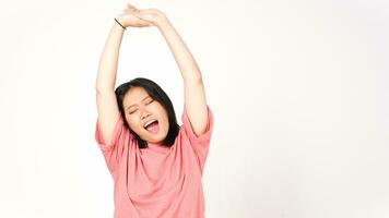 Young Asian woman in pink t-shirt doing wake up stretch isolated on white background photo