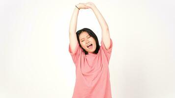 Young Asian woman in pink t-shirt doing wake up stretch isolated on white background photo