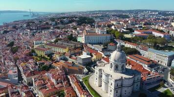 Aerial view of Lisbon city center. Drone forward. View of National Pantheon and Church de Sao Vicente de Fora. Rooftops of Lisbon. Famous European travel destination and capital of Portugal. video