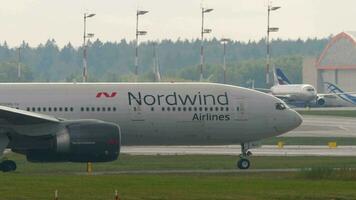Boeing 777 of Nordwind on the taxiway video