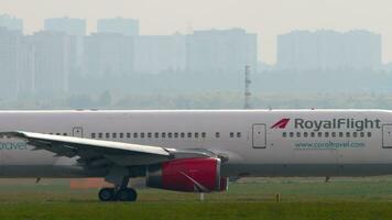 RoyalFlight plane on the taxiway, side view video