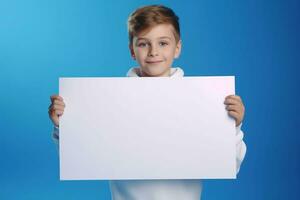 AI generated Little boy holding a blank white sheet of paper photo