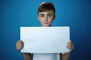 AI generated Little boy holding a blank white sheet of paper photo