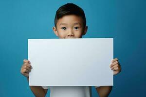 AI generated Little boy holding a blank white sheet of paper photo