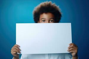 AI generated Little boy holding a blank white sheet of paper photo