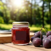 AI generated jar of plum jam with blank front realistic on a mockup template in a wooden table in a summer garden with plum trees, photo