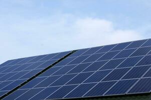 Solar panel on a green roof. photo