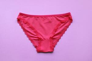 A women panties on a pink background. photo