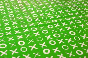Expanded green wrapping paper with letters. photo