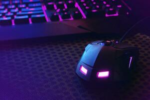 Workspace with a keyboard and mouse on dark background. photo