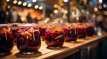 AI generated glasses of hot spiced winter fruit soup at the ice market, photo