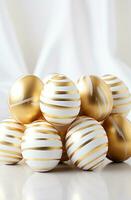 AI generated several gold striped easter eggs on the table with white background, photo