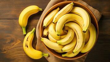 AI generated Top view sweet banana on the wooden table AI Generative photo