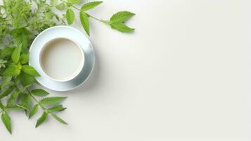 AI generated a top view of a coffee cup with green leaves on a white background. photo