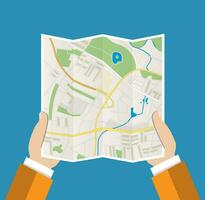 Folded Paper Map In Hand vector