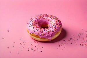 AI generated a pink donut with sprinkles on a pink background photo