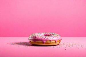 ai generado un rosado rosquilla con asperja en un rosado antecedentes foto