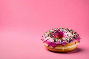 ai generado un rosquilla con rosado Formación de hielo y asperja en un rosado antecedentes foto